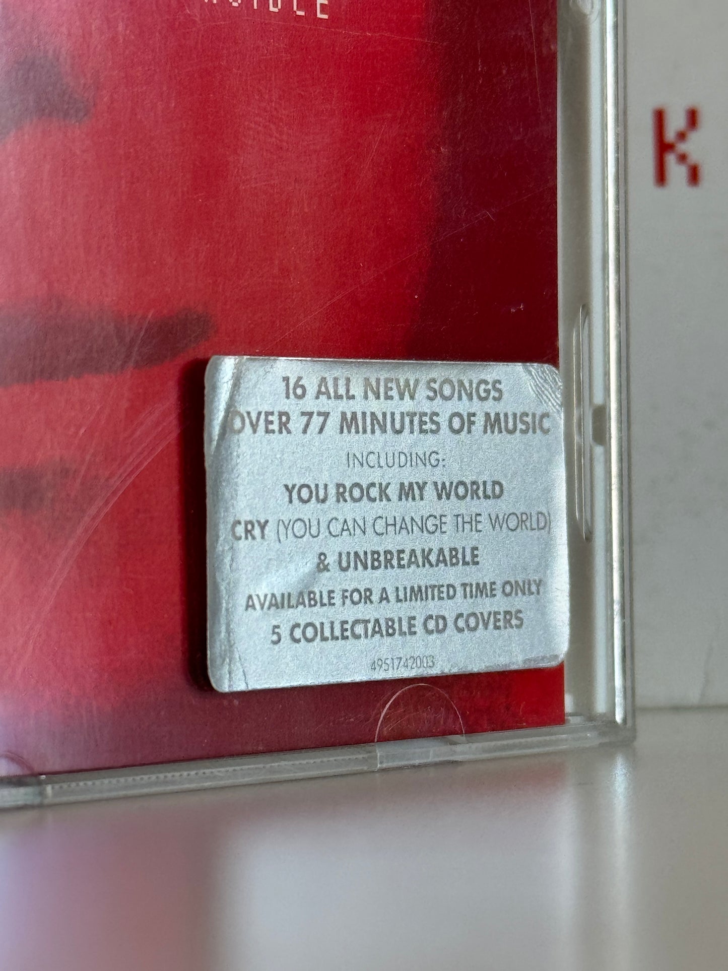 Michael Jackson CD Invincible Red cover 2001