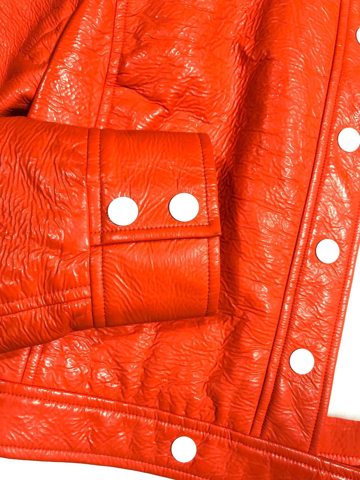 4. Courrèges orange vinyl jacket