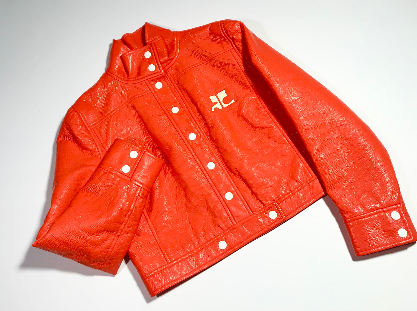 4. Courrèges orange vinyl jacket