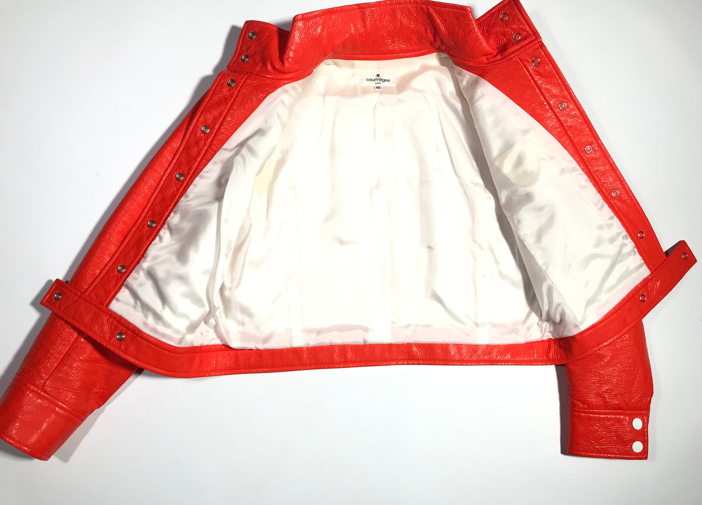 4. Courrèges orange vinyl jacket