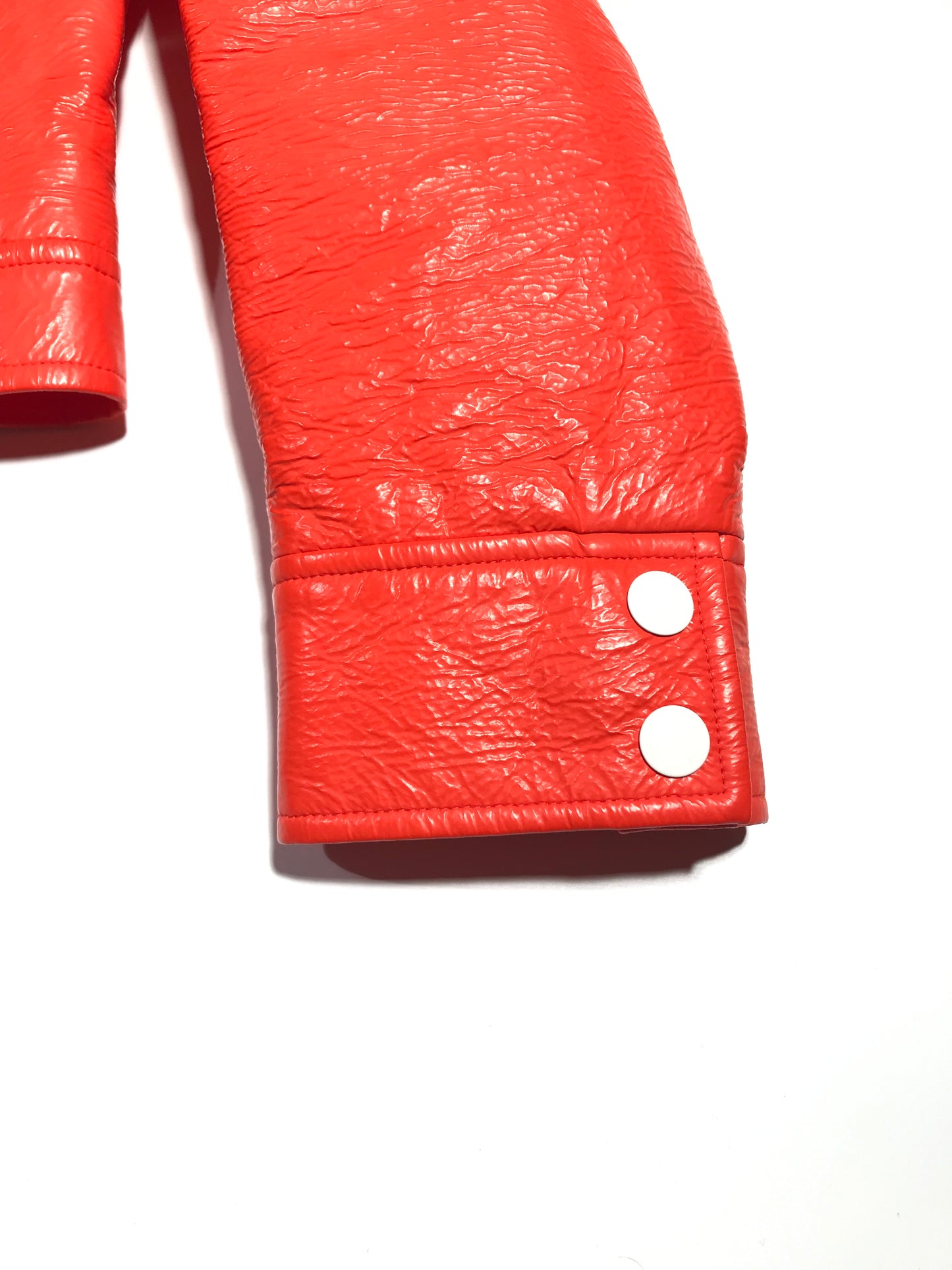 4. Courrèges orange vinyl jacket