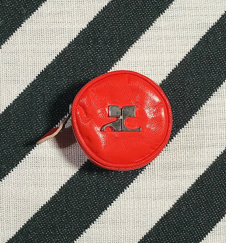 5. Courrèges circle orange purse