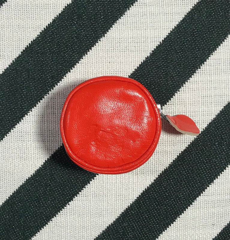 5. Courrèges circle orange purse